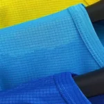oemtshirts.com high quality ready made 100%polyester 140gsm dry-fit round neck shortsleeve regular fit blank check pattern t-shirt wholesale